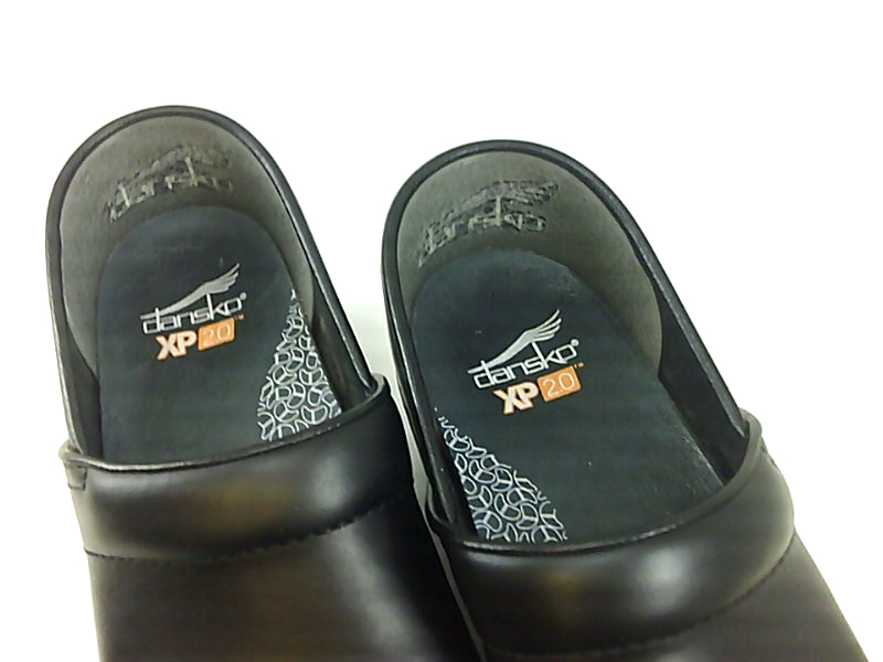 dansko tooled black clogs