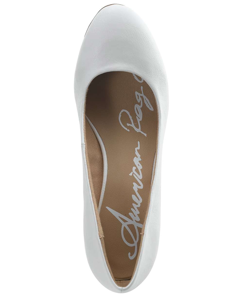 white closed toe pumps